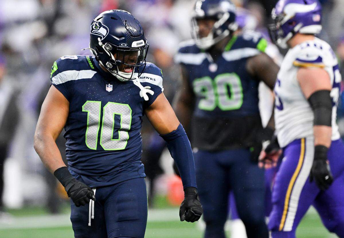 Seattle Seahawks linebacker Uchenna Nwosu (10) reacts to a stop on third down against the Minnesota Vikings during the fourth quarter of the game at Lumen Field, on Sunday, Dec. 22, 2024, in Seattle, Wash.