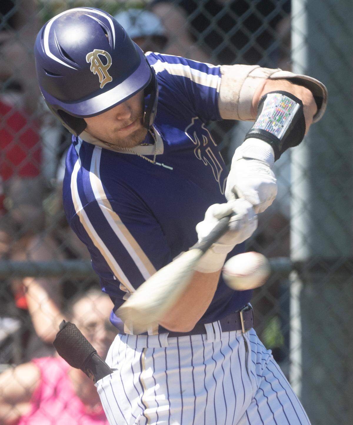 Puyallup’s Gage Thompson connects for a single during the 4A District 3/4 baseball semifinal game against the Camas Papermakers at Art Wright Field in Kent, Washington,l on Saturday, May 11, 2024.