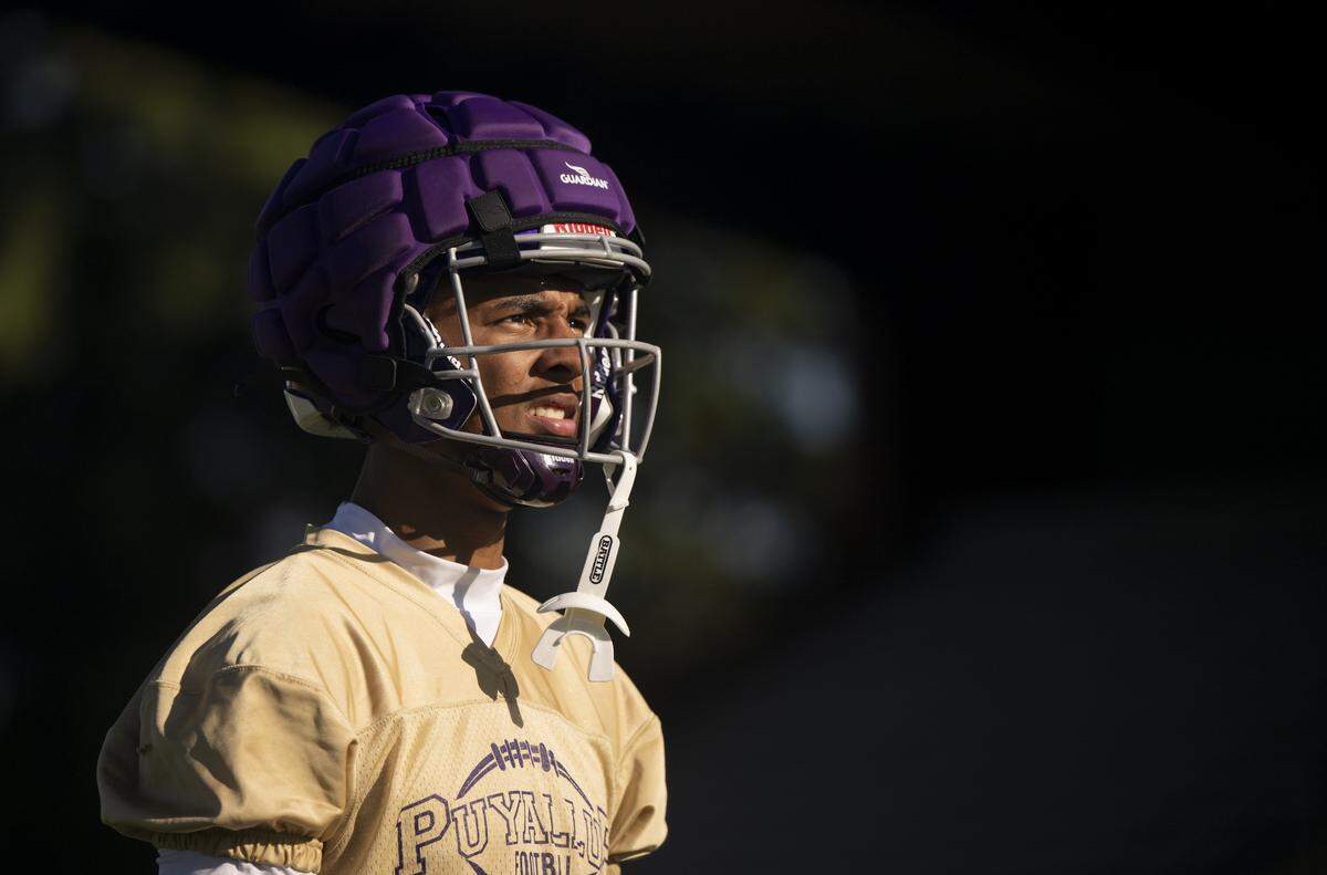 Puyallup wide receiver J'Isaiah Mitchell runs drills during a Puyallup High School football practice at Sparks Stadium on Thursday, Aug. 21, 2025, in Puyallup, Wash.