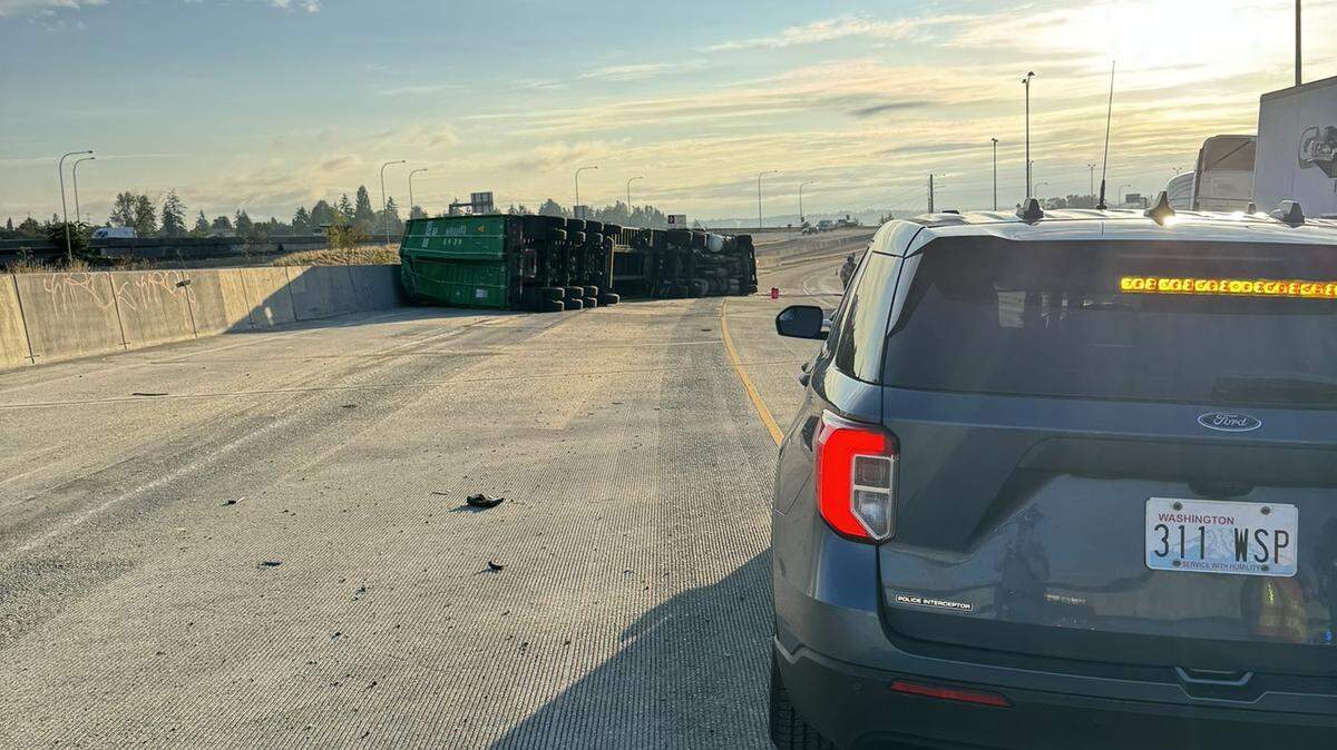 A rolled over semi-truck hauling 94,000 lbs. of hay in Tacoma near State Route 16 will create some delays Wednesday morning.
