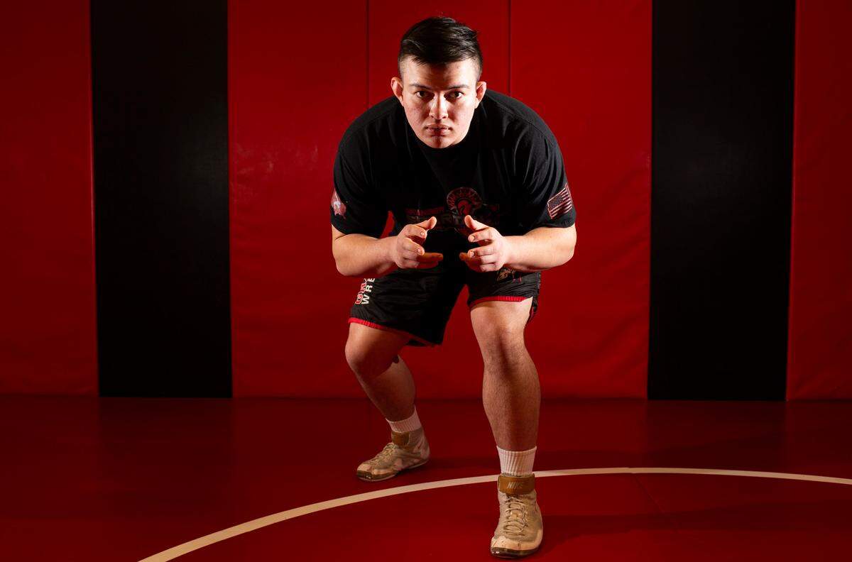 Granger’s Gage Cook poses for a portrait Wednesday, Feb. 9, 2022 at Granger High School in Granger, Wash. Cook, a senior, won state championships in wrestling his freshman and sophomore seasons.