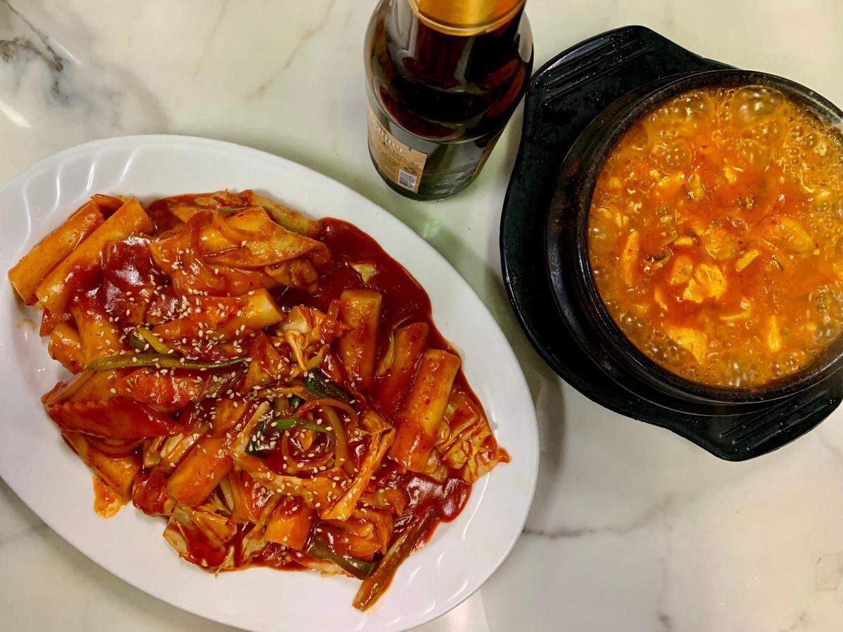 Ho Soon Yi, known for its kalbi beef and tofu soup, the latter pictured here with tteokkbokki, is one of several excellent Korean restaurants in Lakewood.