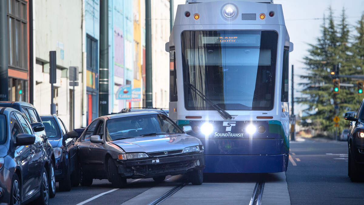 A Tacoma Light Rail train sits on Commerce Street east of South 9th Street after colliding with a car in downtown Tacoma, Wash., on Thursday, Oct. 10, 2024.