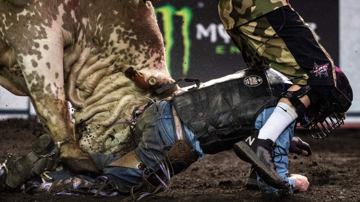 Bob Mitchell is rammed by the bull named, The Undertaker, after being bucked off while competing in the 2022 Professional Bull Riders Unleash the Beast Tour in the Tacoma Dome in Tacoma, Wash. on Saturday, April 9, 2022.