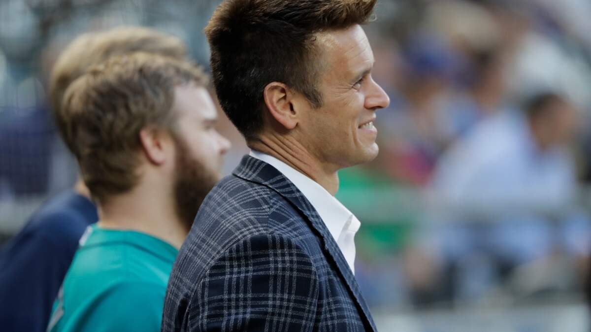Seattle Mariners general manager Jerry Dipoto stands on the field before a baseball game against the Toronto Blue Jays, Friday, Aug. 3, 2018, in Seattle. (AP Photo/Ted S. Warren)