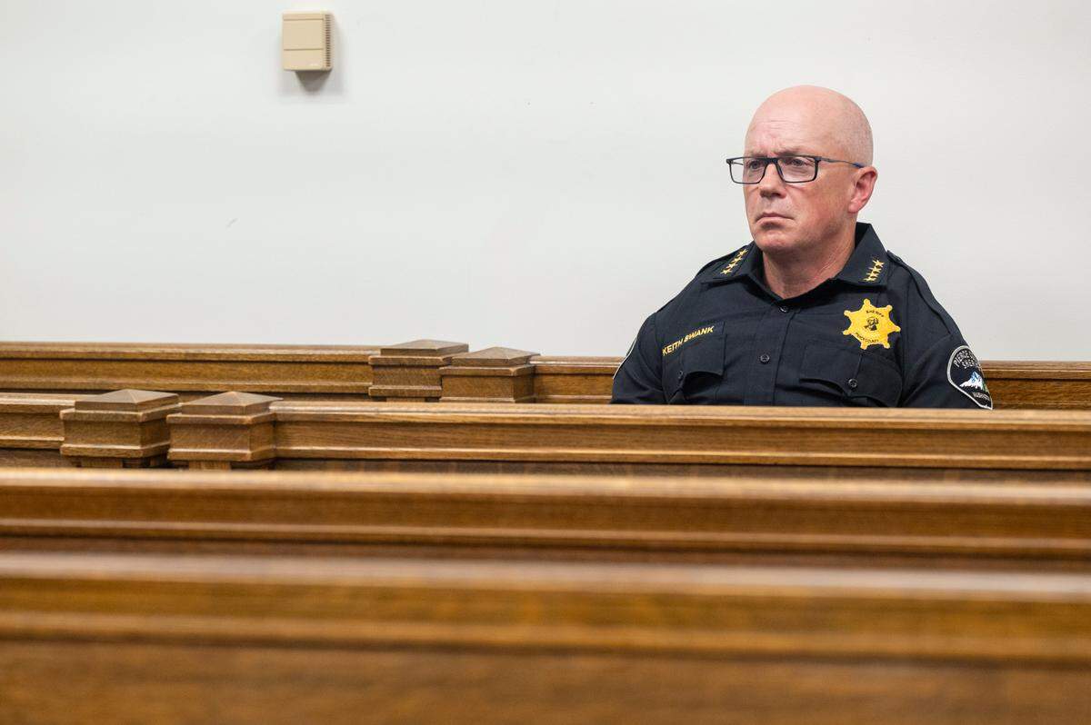 Pierce County Sheriff Keith Swank sits in the gallery for a hearing in a civil case where Pierce County Prosecuting Attorney Mary Robnett is seeking to bar Joan Mell from acting as Swank’s attorney on Monday, June 16, 2025, at the King County Courthouse in Seattle, Wash.
