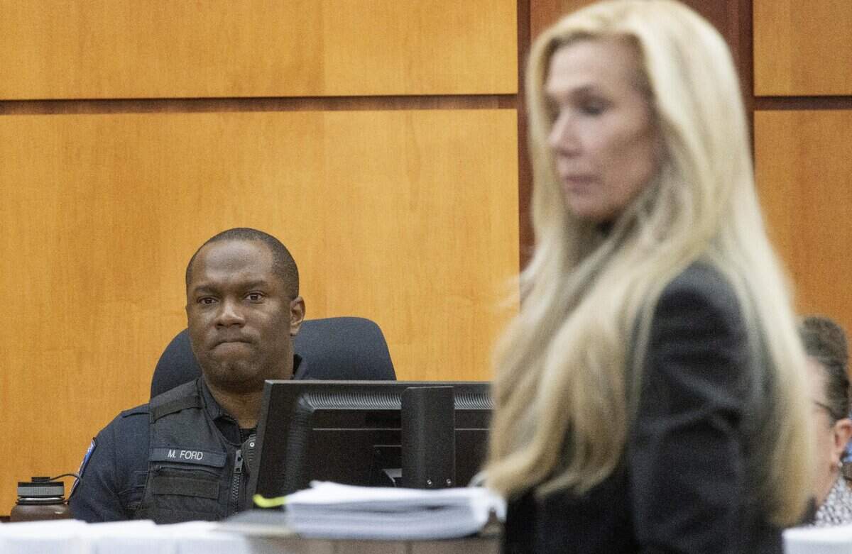 Defense attorney Anne Bremner, attorney for Timothy Rankine, right, asks questions of Tacoma Police Officer Masyih Ford in Pierce County Superior Court Wednesday Nov. 15, 2023, in Tacoma, WA. Officers Christopher Burbank, Matthew Collins and Timothy Rankine are charged with the death of Manny Ellis. Ford was RankineÕs partner at the time of his killing. (Ellen M. Banner / Pool / The Seattle Times)