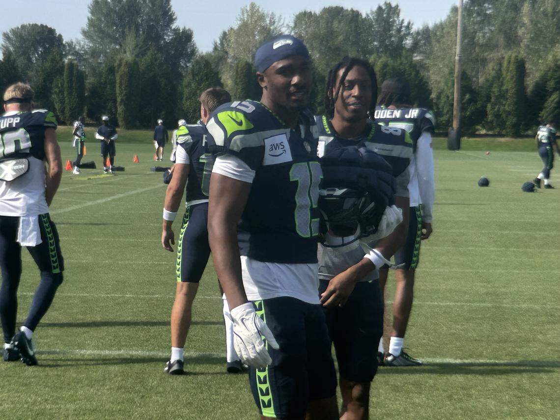 Rookie wide receivers Tory Horton (15) and Ricky White (right of Horton) getting ready for the eighth practice of Seattle Seahawks NFL training camp Thursday, July 31, 2025, at the Virginia Mason Athletic Center in Renton.