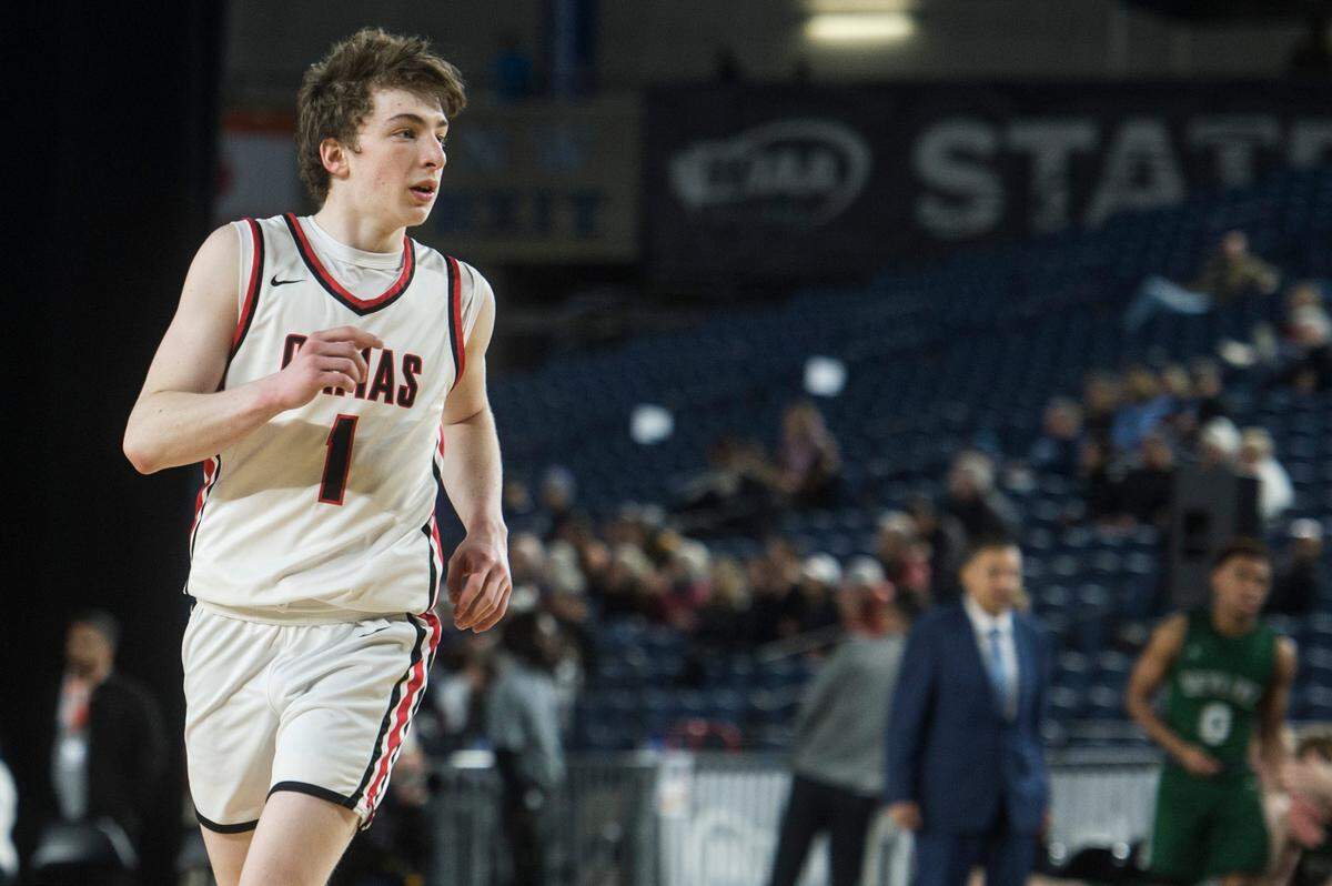 Camas guard Beckett Currie runs up the court in the fourth quarter in a game against Skyline in the consolation round of the Class 4A boys state basketball tournament on Friday, March 3, 2023 at the Tacoma Dome in Tacoma, Wash.