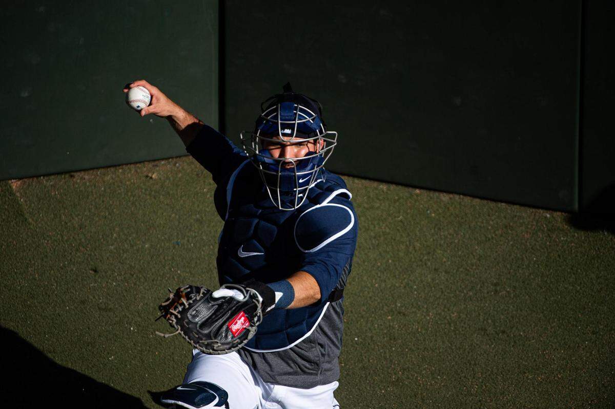 Mariners catcher Luis Torrens warms up during a Mariners team practice at T-Mobile Park in Seattle, Wash., on Wednesday, Sept. 2, 2020.