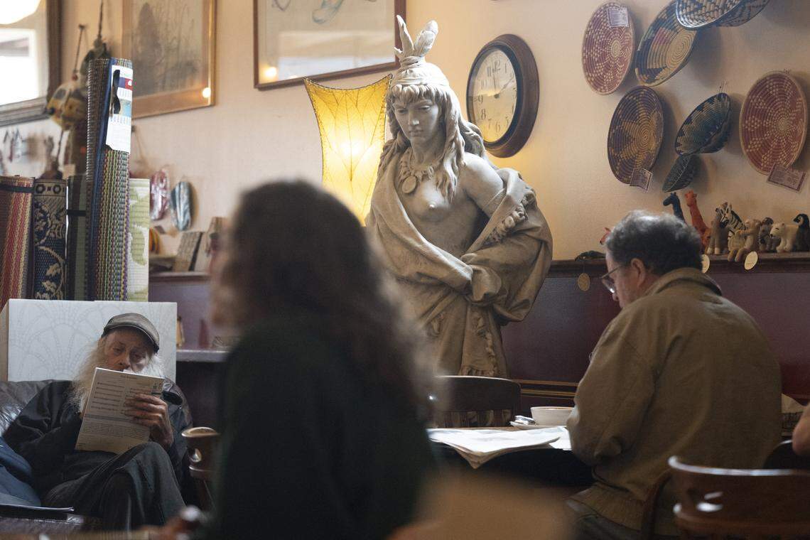 Pieces from Arlene Herridge’s collection decorate Antique Sandwich Co., including a statue called Colombo, pictured on Tuesday, April 14, 2026, in Tacoma. The statue was carved in Italy for the 1893 Columbia Exposition in Chicago, owners Tamie Herridge and Shirley Herridge shared.