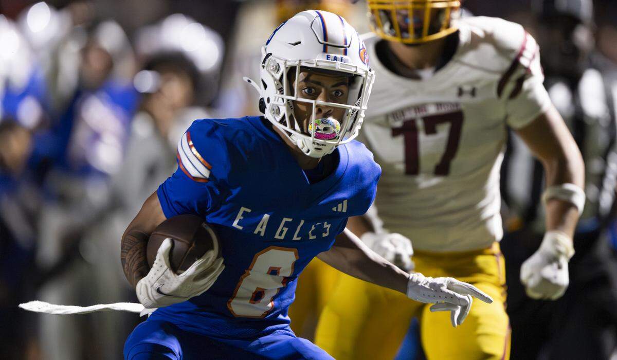 Graham-Kapowsin Eagles wide receiver Maazia Roberson (8) moves to pick up more yards after the catch during the second half of the game against the O'Dea Fighting Irish at Art Crate Field, on Friday, Sept. 5, 2025, in Spanaway, Wash.