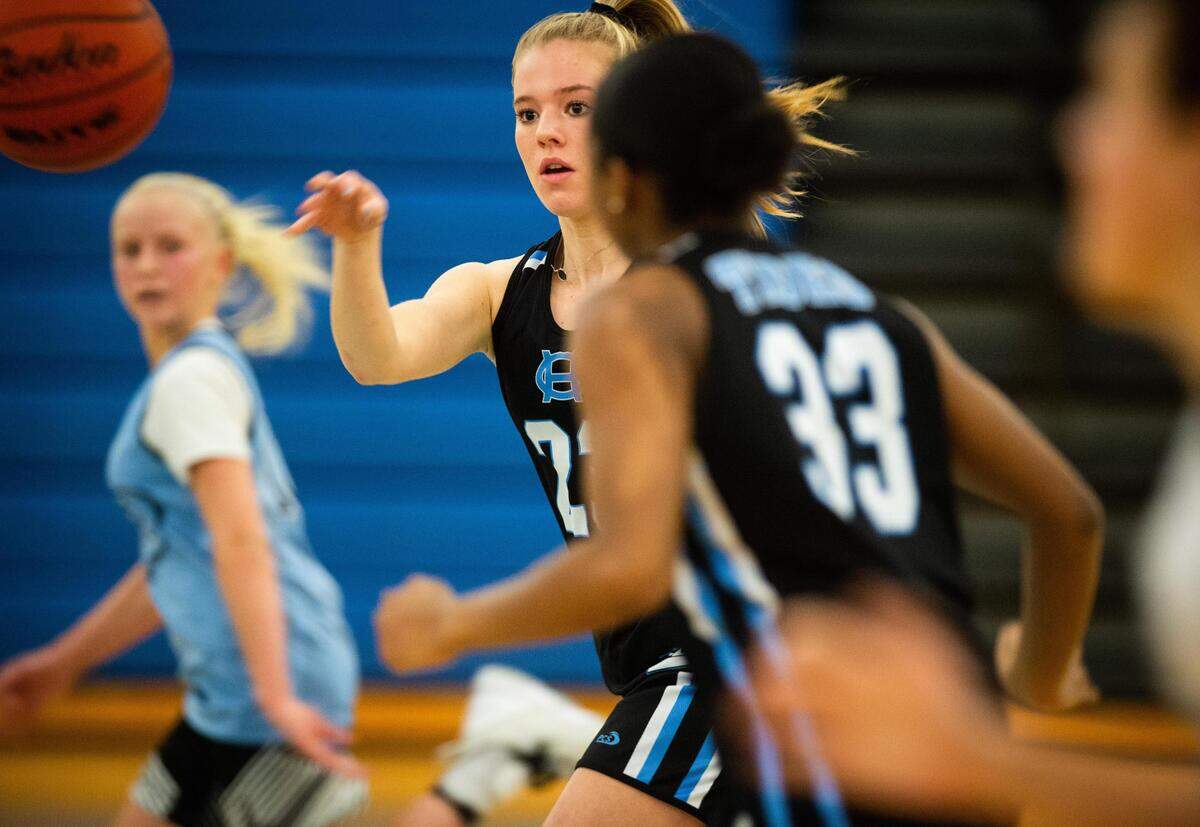 Gig Harbor High School freshman Baylee Young makes a pass during practice at Gig Harbor High School in Gig Harbor, Wash., on Thursday, Jan. 9, 2020.