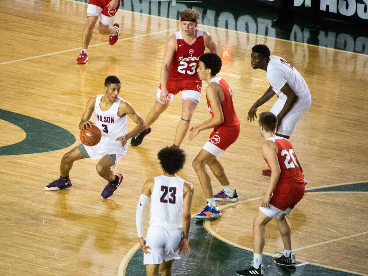 Wilson’s Cayden McDaniel gets to work on offense during the second quarter. Wilson played Marysville-Pilchuck in a basketball game at Hardwood Classic at the Tacoma Dome in Tacoma, Wash., on Friday, March 6, 2020.