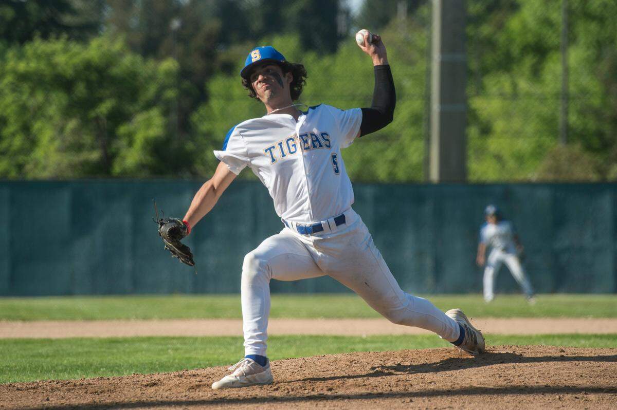 Stadium starter Marcel Mercado (5) throws a pitch in a game against Gig Harbor in the opening round of the Class 3A state baseball playoffs on Tuesday, May 16, 2023 at Heidelberg Sports Complex in Tacoma, Wash.