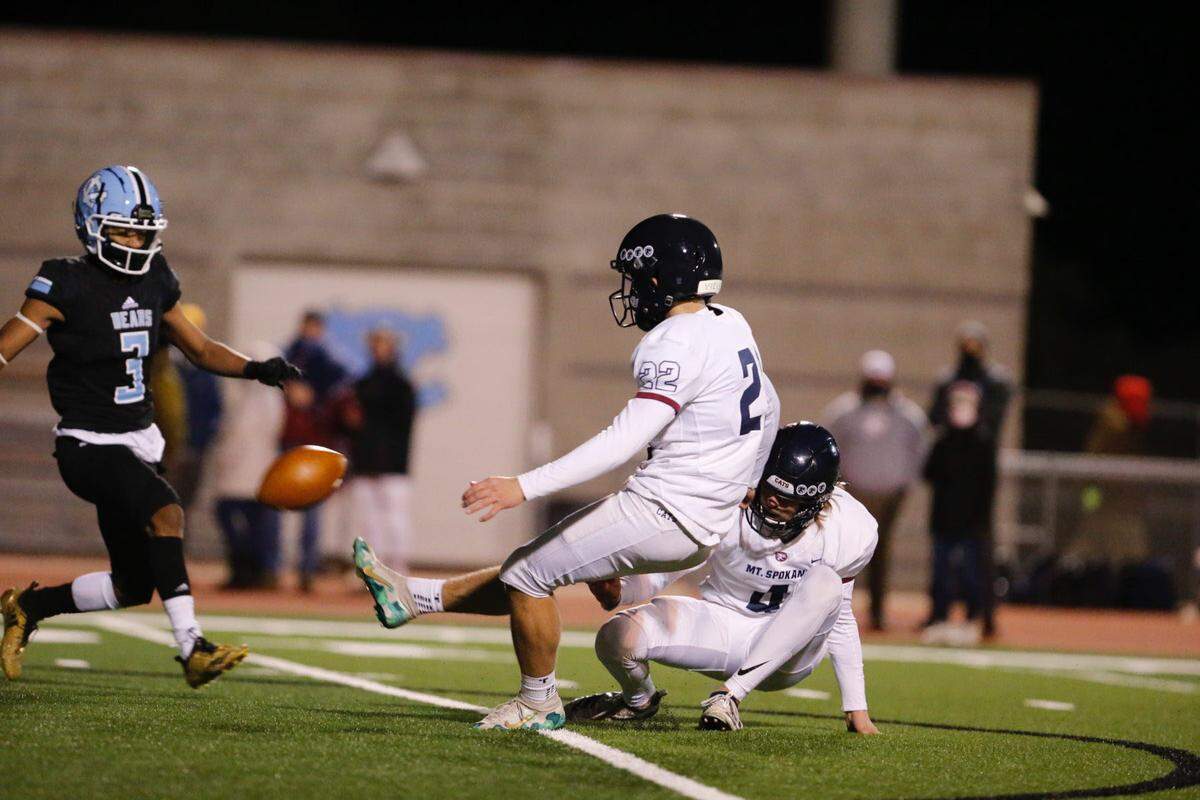 Mount Spokane High School kicker Ethan Moczulski (32).