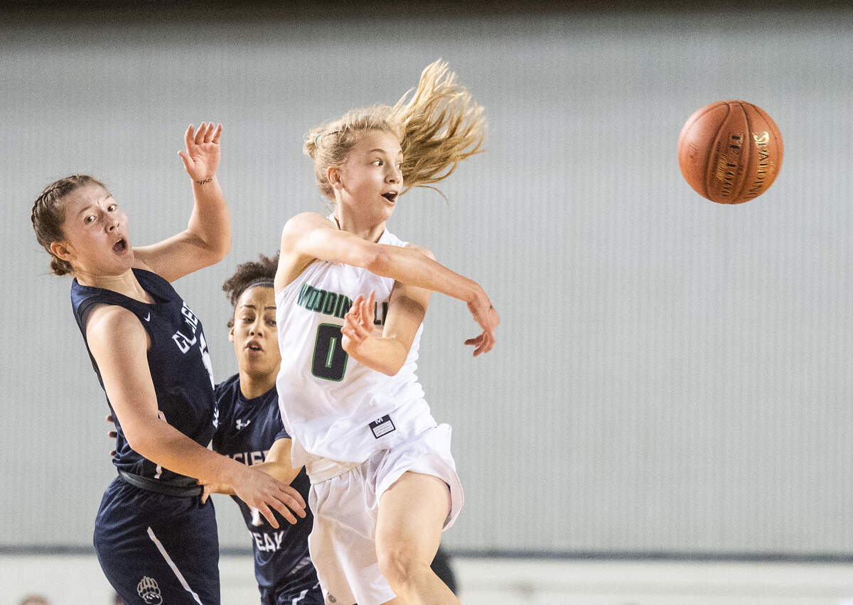 Woodinville’s Tatum Thompson throws out a pass during the second quarter. Woodinville played Glacier Peak in a basketball game at Hardwood Classic at the Tacoma Dome in Tacoma, Wash., on Friday, March 6, 2020.