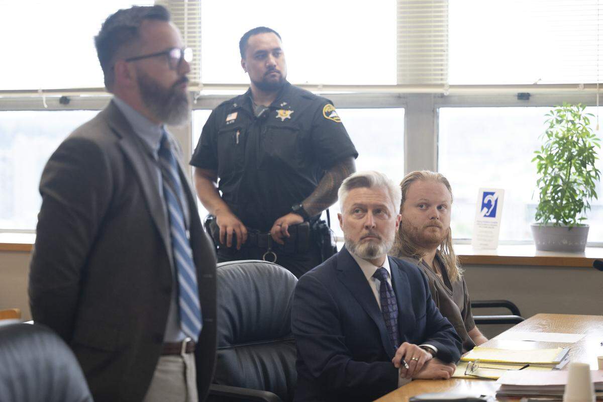 Prosecutor Derek Keenan, left, speaks as defense attorney Michael Stewart, center, and defendant Lars Nelson, right, sit in court for Nelson's sentencing on Thursday, June 4, 2026, at Pierce County Superior Court in Tacoma, Wash. Nelson, 30, pleaded guilty in April to second-degree murder for fatally shooting 27-year-old Sophie Tinney on April 20, 2025 in a Fox Island home.