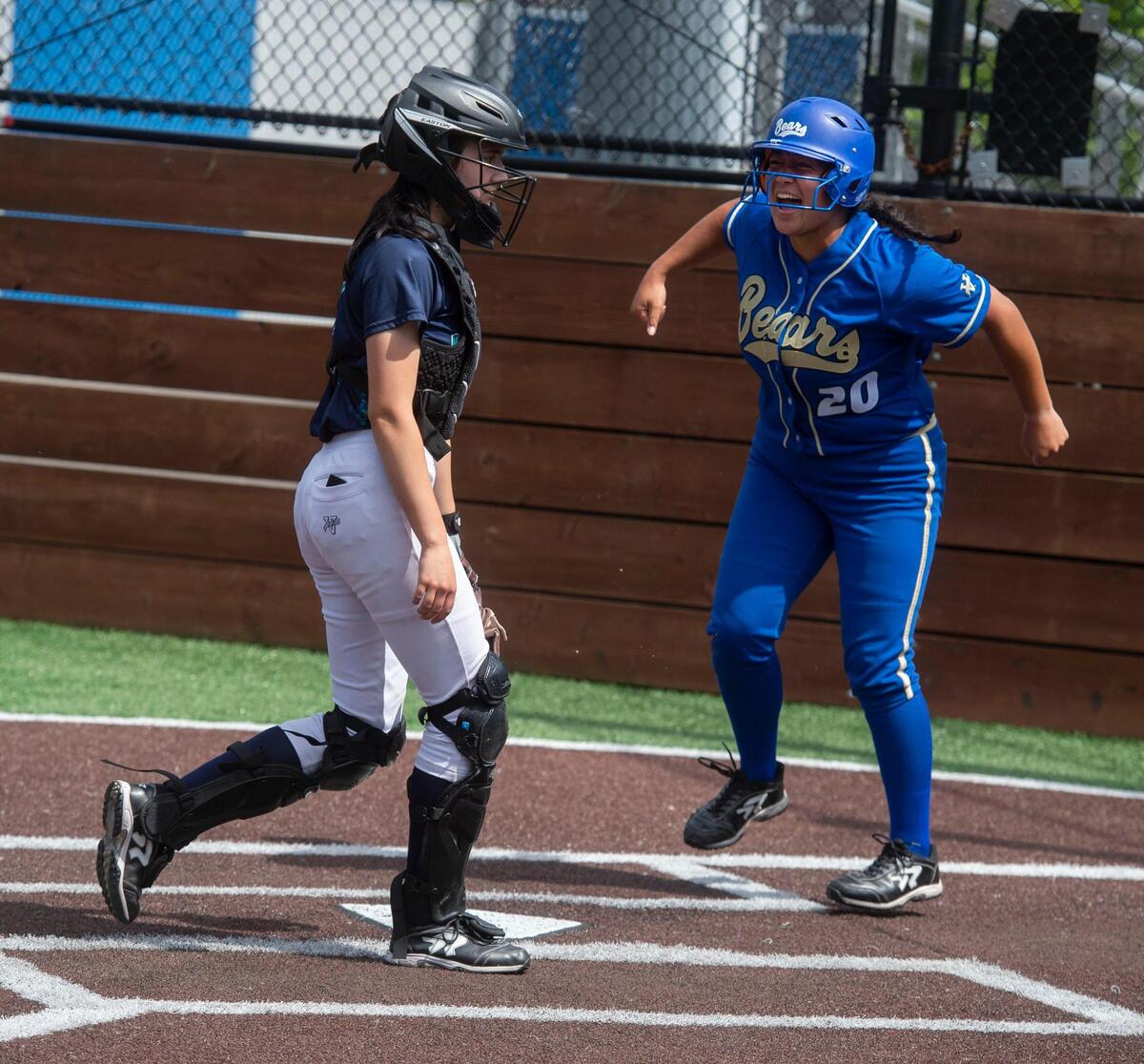 Tahoma infielder Kaiea Higa exults after scoring on a sac fly by Hailey Sheffer that gave the Bears a 5-4 lead in the top of the seventh. Photo taken at the NPSL softball championship game between Tahoma and Auburn Riverside on Saturday, May 22 at Auburn Riverside High School.