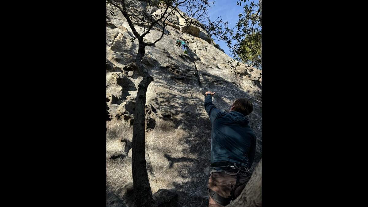 TNT outdoors writer Gavin Feek and his daughter “top roping” at a crag with a bolted anchor.