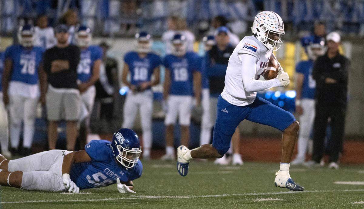 Graham Kapowsin wide receiver Malachi Durant breaks away from Curtis defensive lineman Kingston Kerkhoff during Friday night’s 4A SPSL football game at Viking Stadium in University Place, Washington, on Oct. 6, 2023. Graham Kapowsin won the game, 42-35.