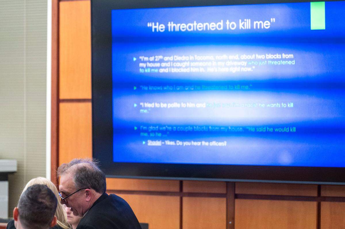 Pierce County Sheriff Ed Troyer whispers to his defense attorney, Anne Bremner, while Washington state assistant attorney general Melanie Tratnik makes her closing arguments on Tuesday, Dec. 13, 2022, in Pierce County District Court in Tacoma.