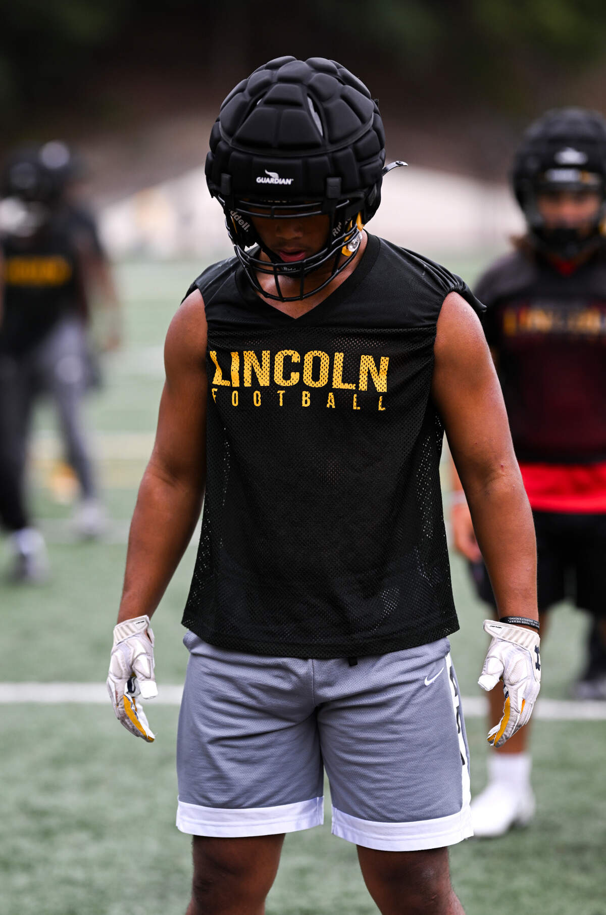 Lincoln linebacker Dre Sio Fetau runs drills during a football practice at Lincoln High School, on Wednesday, Aug. 21, 2024, in Tacoma, Wash.