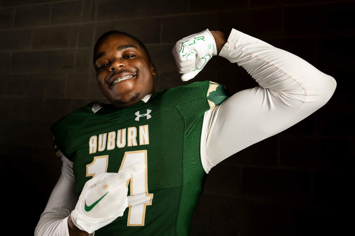 Auburn senior defensive end Luvens Valcin poses for a portrait after being selected as first-team defense for The News Tribune’s 2023 All-Area football team at Mount Tahoma High School, on Sunday, Dec. 10, 2023, in Tacoma, Wash.