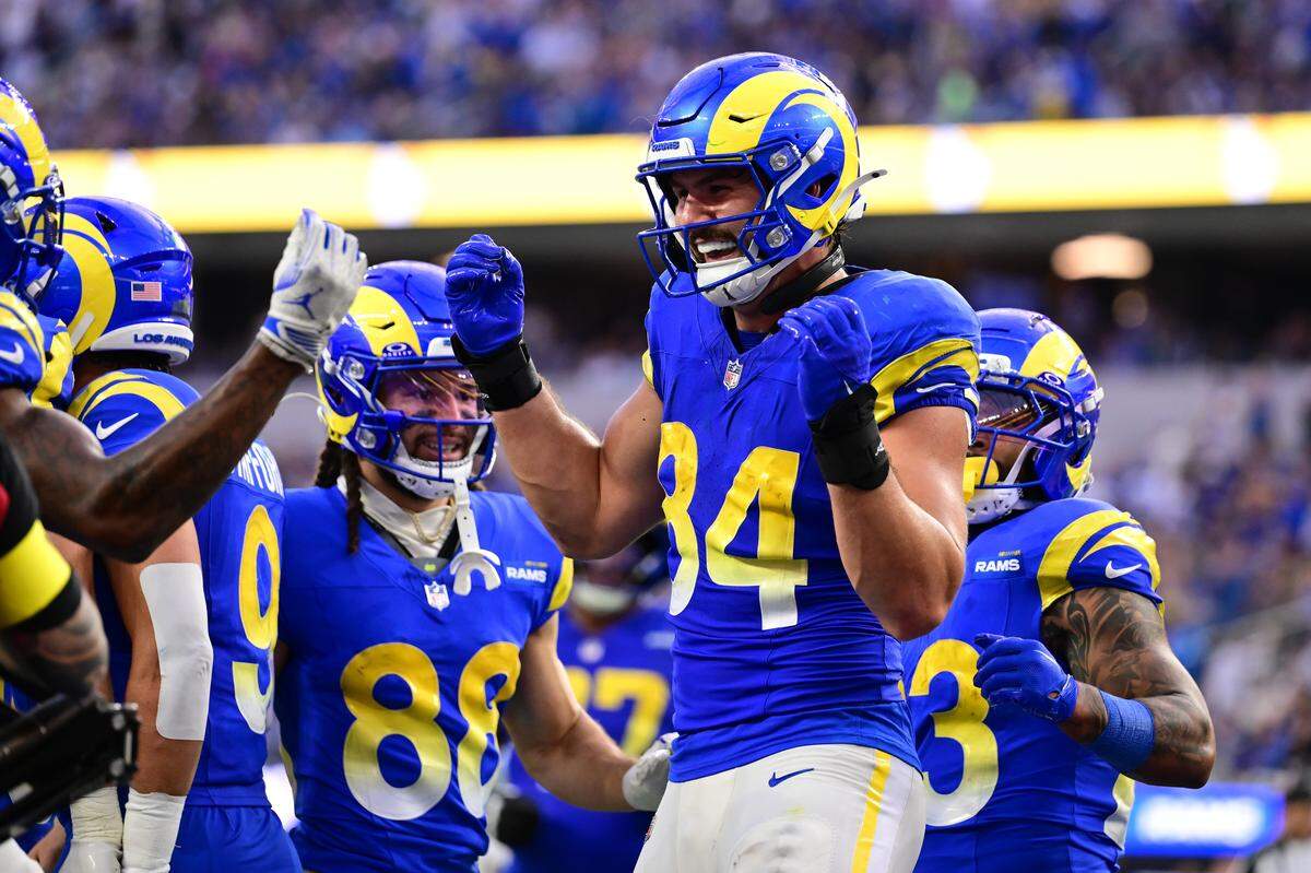 INGLEWOOD, CALIFORNIA - DECEMBER 14: Colby Parkinson #84 of the Los Angeles Rams celebrates with teammates after scoring a touchdown against the Detroit Lions during the third quarter at SoFi Stadium on December 14, 2025 in Inglewood, California. (Photo by Wally Skalij/Getty Images)