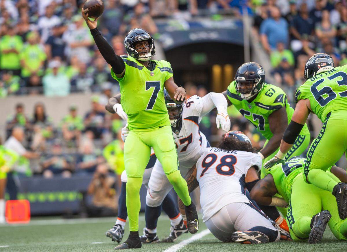 Seattle Seahawks quarterback Geno Smith (7) passes the ball in the second quarter of an NFL game on Monday, Sept. 12, 2022, at Lumen Field in Seattle.