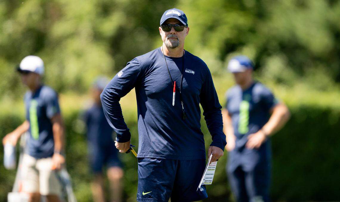 Seahawks offensive coordinator Ryan Grubb watches during the first day of training camp at the Virginia Mason Athletic Center, on Wednesday, July 24, 2024, in Renton.