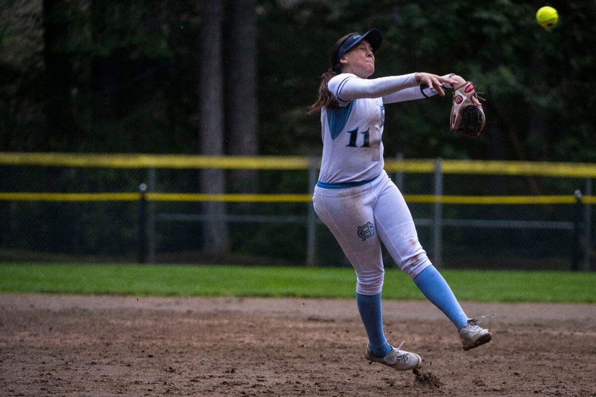 After cleanly fielding a ground ball, Gig Harbor shortstop Riley Peschek makes an off-balance throw across the diamond in hopes of getting an out at first base during a 3A South Sound Conference game against Peninsula on Monday, April 17, 2023, at Peninsula High School in Gig Harbor, Wash.