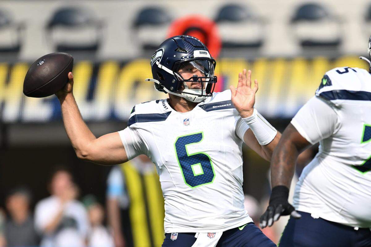 Aug 10, 2024; Inglewood, California, USA; Seattle Seahawks quarterback Sam Howell (6) throws a pass against the Los Angeles Chargers during the first quarter at SoFi Stadium. Mandatory Credit: Jonathan Hui-USA TODAY Sports