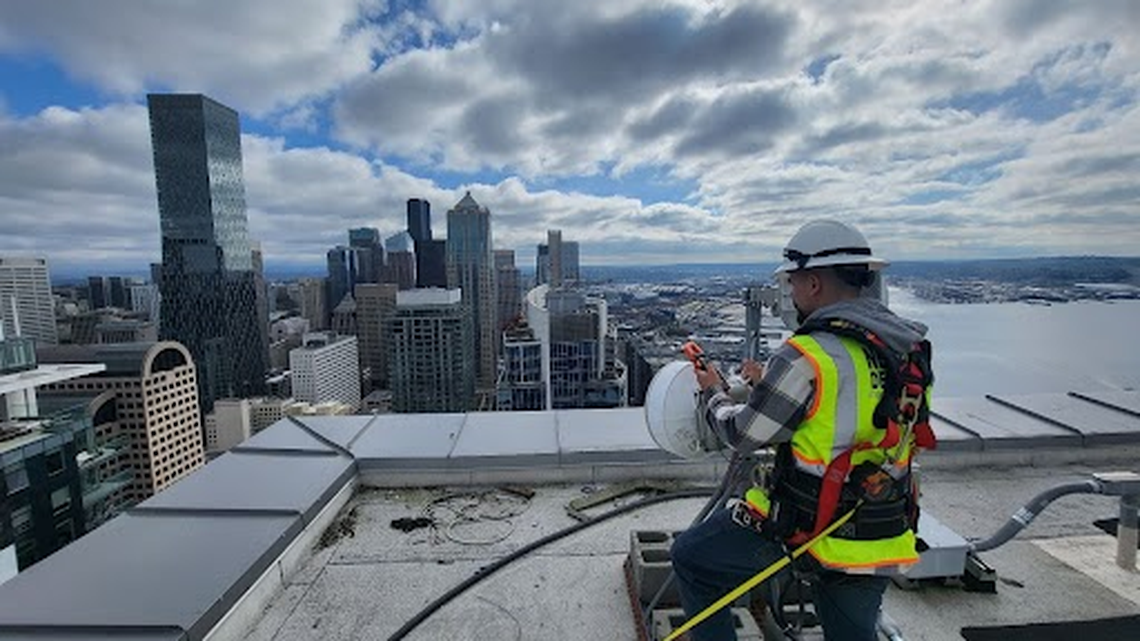 Astound Broadband’s Wireless Network Deployment Team installed systems on rooftops in Seattle similar to the one that will be deployed to Herron Island, allowing customers high-speed internet access.