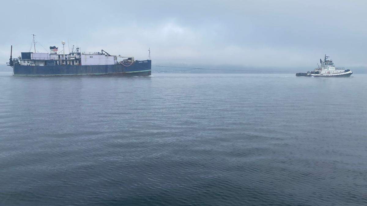 The Pacific Producer is towed from Tacoma’s Foss Waterway to Seattle’s Ship Canal on Nov. 28, 2023.
