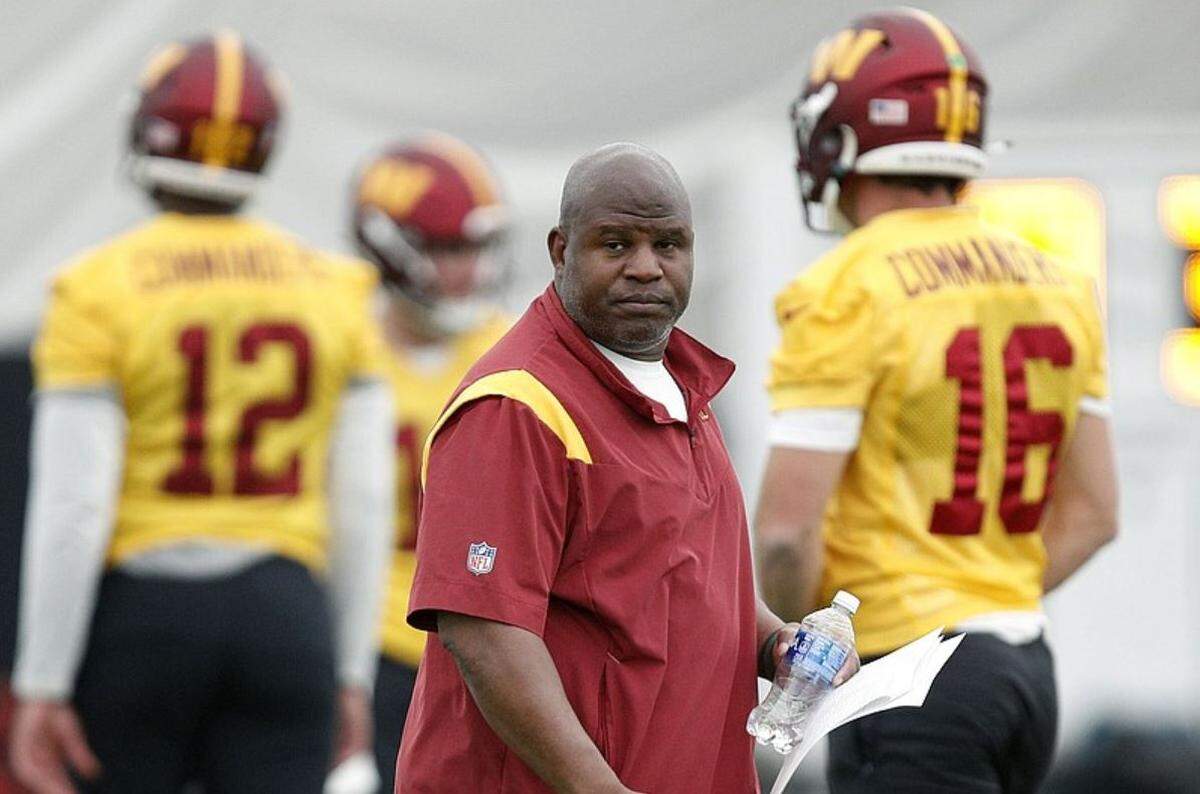 Washington Commanders assistant head coach and offensive coordinator Eric Bieniemy, 54, watches practice at the team’s training facility in June 2023 at Ashburn, Virginia.