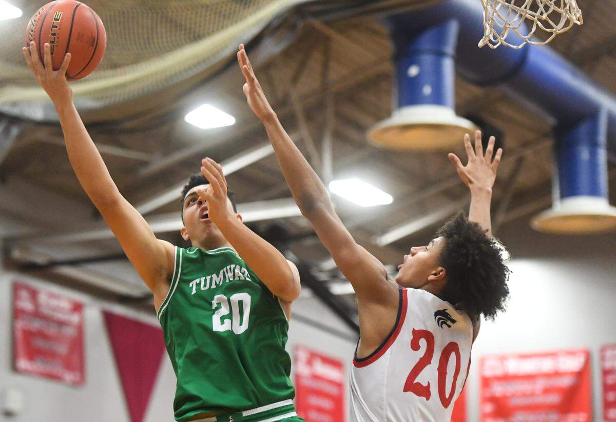 Tumwater’s Damon Gaither shoots during the first quarter. Black Hills played Tumwater in a basketball game at Black Hills High School in Olympia, Wash., on Friday, Jan. 24, 2020.