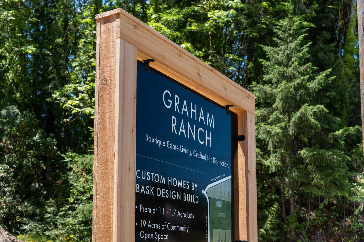 A sign for Graham Ranch, a future gated community with seven custom-built homes near 40th Street Northwest and Wollochet Drive, near Gig Harbor, Wash.