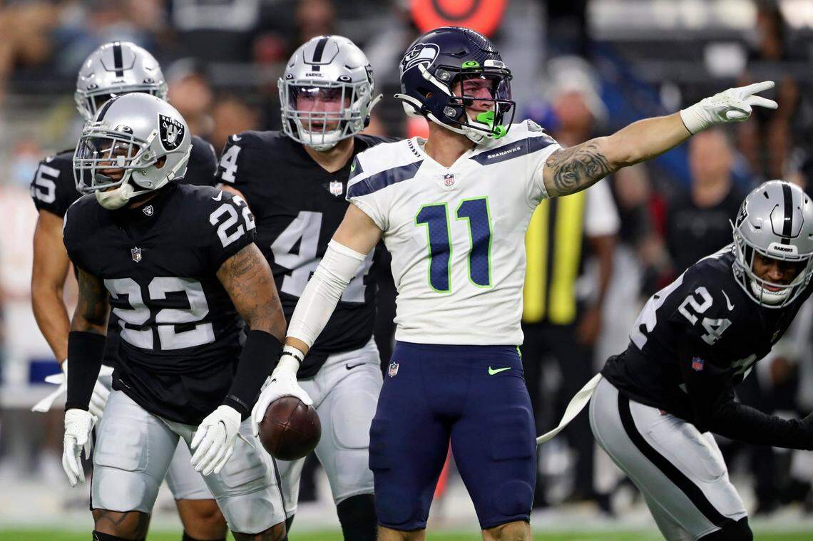 Seattle Seahawks wide receiver Cody Thompson (11) reacts after a play against the Las Vegas Raiders during the first half of an NFL preseason football game, Saturday, Aug. 14, 2021, in Las Vegas. (AP Photo/Steve Marcus)