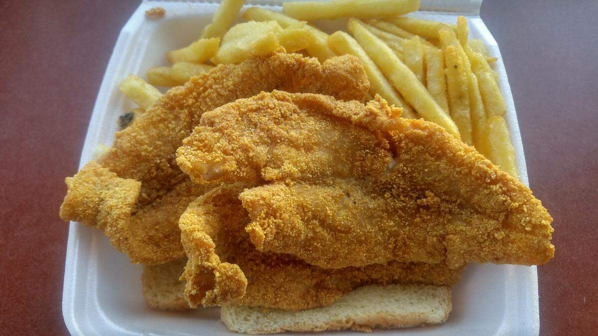 A three-piece catfish dinner with fries, white bread and coleslaw, from JJ Fish and Chicken in Lakewood.