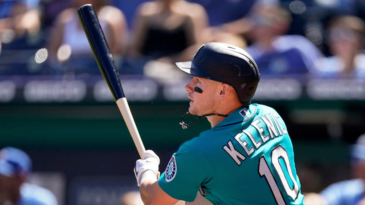 Seattle Mariners’ Jarred Kelenic hits a two-run double during the first inning of a baseball game against the Kansas City Royals Sunday, Sept. 19, 2021, in Kansas City, Mo. (AP Photo/Charlie Riedel)