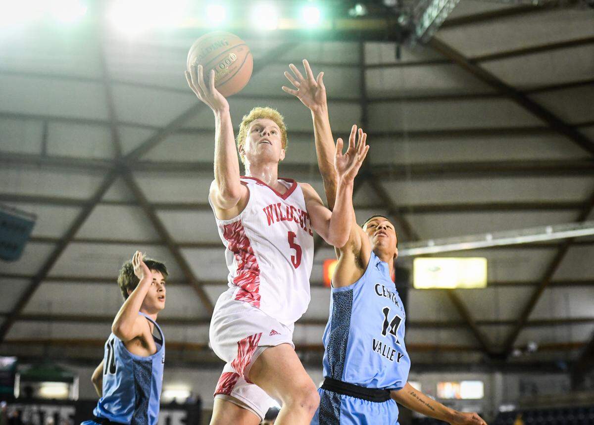 Mount Si’s Jabe Mullins shoots during the second quarter. Mount Si played Central Valley in the 4A boys championship game at the Hardwood Classic state basketball tournament at the Tacoma Dome in Tacoma, Wash., on Saturday, March 7, 2020.