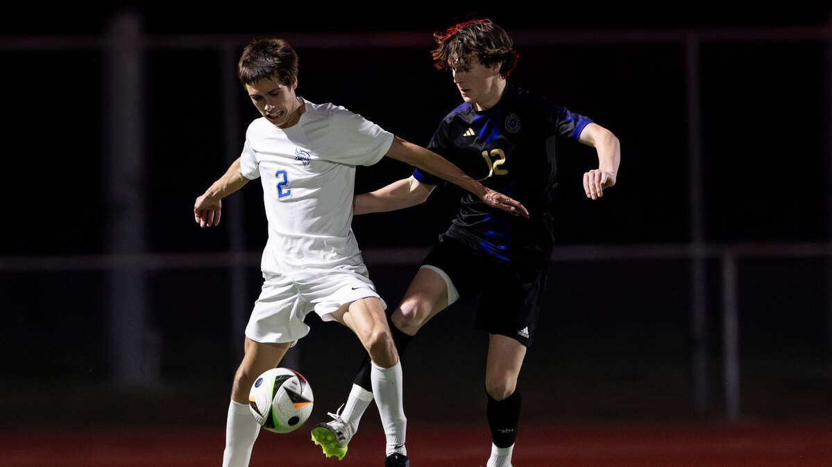 Sumner midfielder Aiden Vannoy (12) steals the ball from Curtis defender Drew Castellanos (2) during the 4A District Boys Soccer Championship match at Auburn Memorial Stadium, on Thursday, May 9, 2024, in Auburn, Wash.
