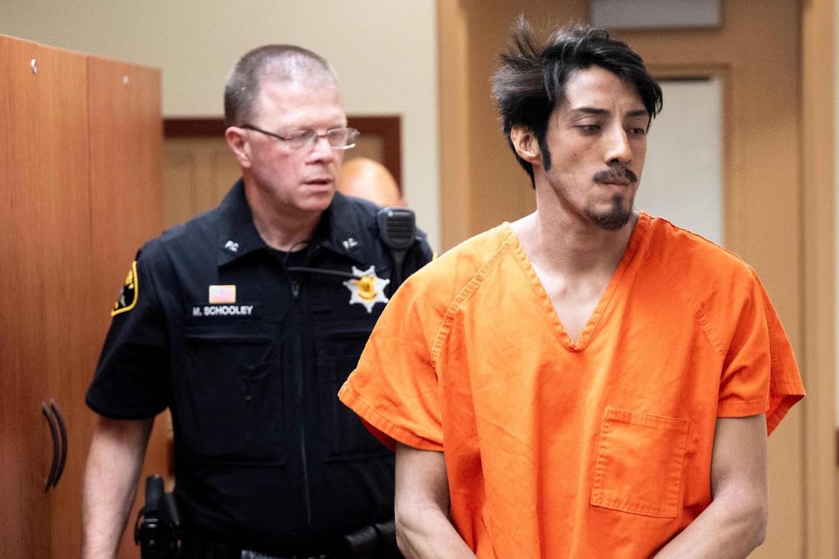 Luis Huitron Campos, 25, is arraigned for two counts of first-degree murder and first-degree arson, at Pierce County Superior Court, on Wednesday, May 21, 2025, in Tacoma. He is accused of killing his father, Oliverio Huitron-Rosalez, 64, and brother, Alejandro Huitron Campos, 31.
