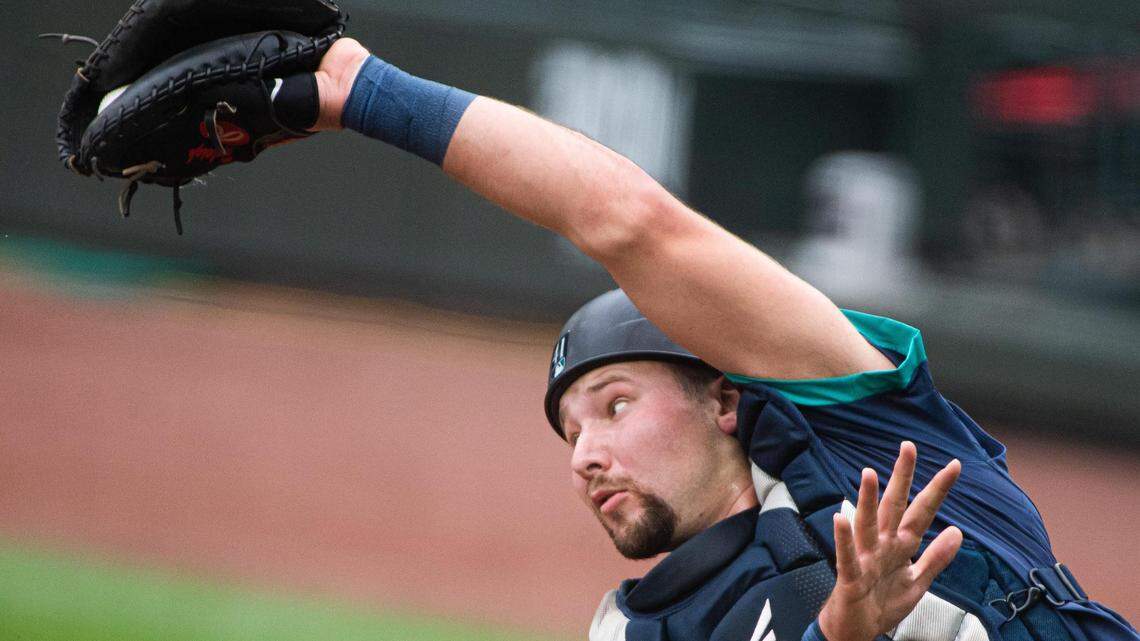 Top catching prospect Cal Raleigh getting valuable experience in Mariners camp | Tacoma News Tribune