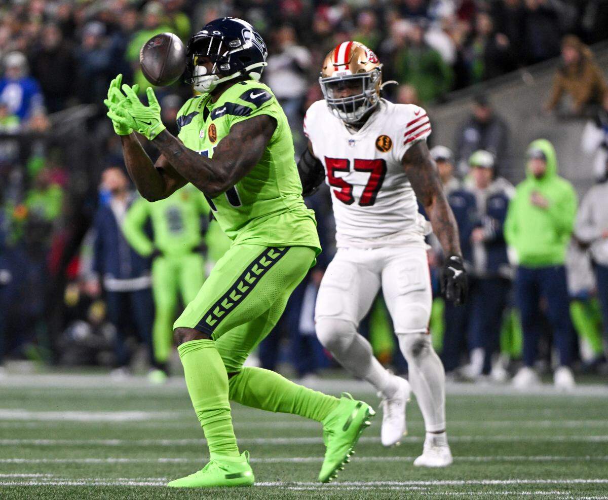 Seattle Seahawks wide receiver DK Metcalf (14) nearly catches a pass during the first quarter of the game against the San Francisco 49ers at Lumen Field, Thursday, Nov. 23, 2023, in Seattle, Wash.