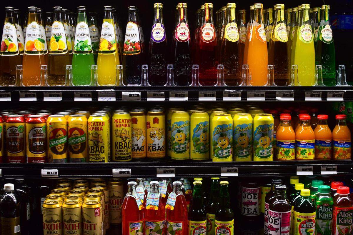 A long wall of cold beverages quenches thirst with water, soda and energy drinks to imported juice and other drinks like the fermented kvass.