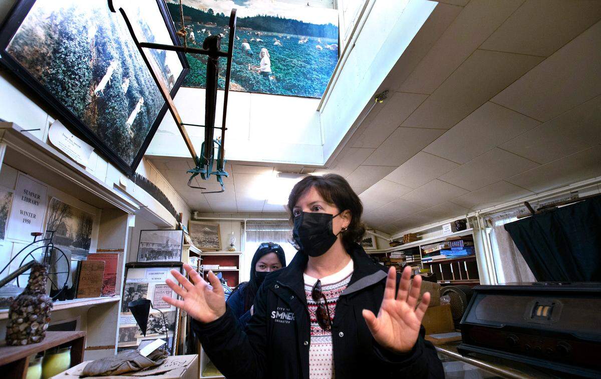 City of Sumner spokesperson Carmen Palmer inside the Sumner Ryan House Museum at Lucy V. Ryan Park in downtown Sumner, Washington, on Wednesday, Feb. 16, 2022. The city is planning to renovate the historic home and public park to encourage visitors to what many people think is a private residence, she said.