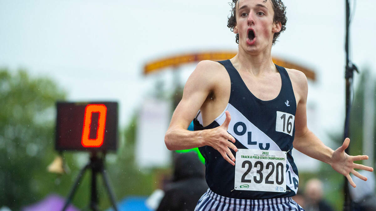 Olympia’s Ethan Coleman reacts after winning the 4A boys 1600-meters race at the State 2A, 3A, 4A track and field championships on Thursday, May 26, 2022, at Mount Tahoma High School in Tacoma Wash.