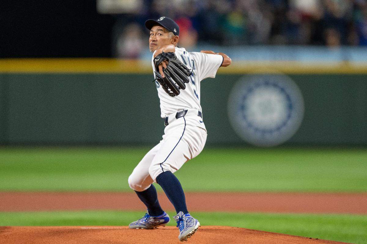 Former Mariner Ichiro Suzuki throws out the first pitch on Opening Day prior to the start of Mariners game against the Oakland Athletics on Thursday, March 27, 2025, at T-Mobile Park in Seattle.